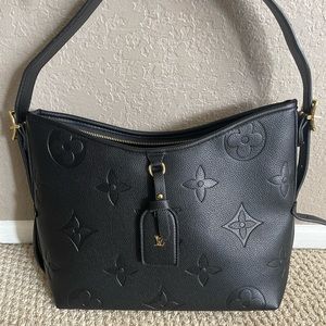 LOUIS VUITTON CARRYALL PM